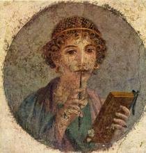 portrait of scribe with pen and book