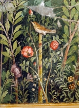 fresco. Sparrow rests on a pole against a background of rose bushes
