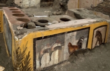 Photo of an ancient lunch counter on a street in Pompeii
