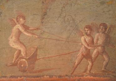 ancient fresco of angels pulling a chariot