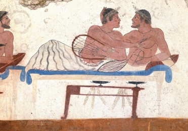 A detail from a Roman painting showing two men reclining