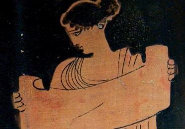 Ancient drawing of woman looking at scroll