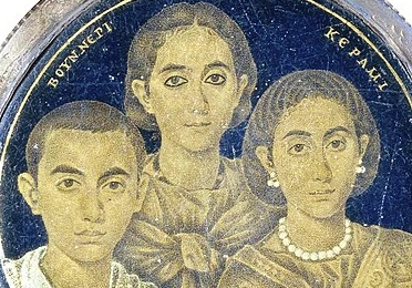 Circular image of mother with two children