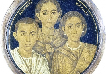 circular image with mother and children