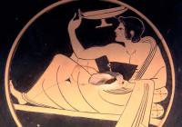 Detail of a Greek vase painting depicting a man eating while reclining