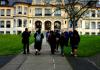 students approach Denny Hall